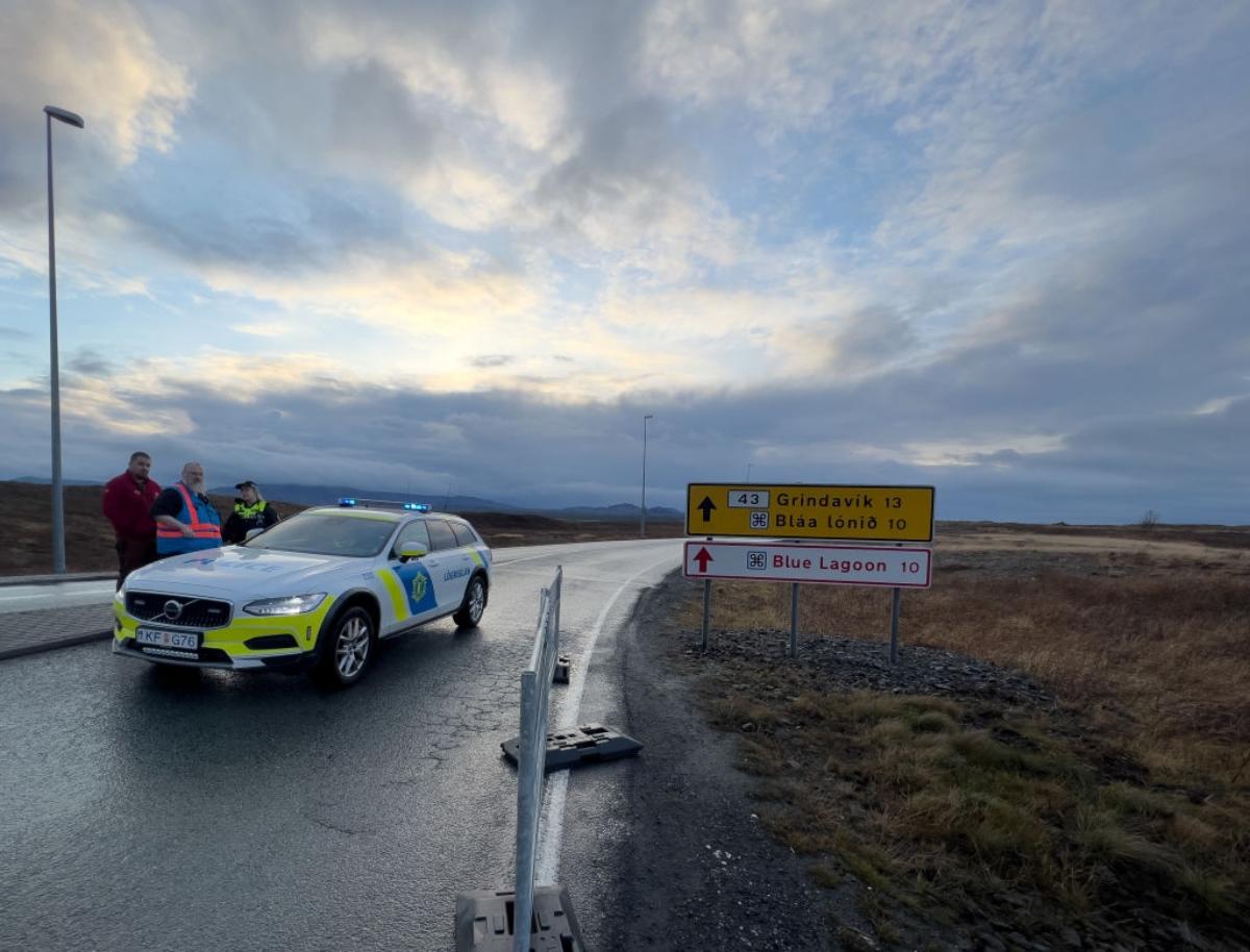 closed road with police vehicle