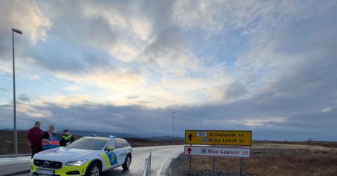closed road with police vehicle