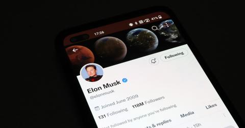 A photo of a phone screen pulled up on Elon Musk's profile on the social media platform X.