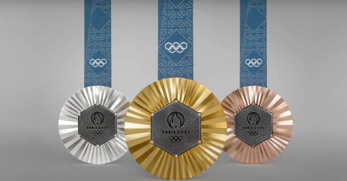 Images of three of the 2024 Paris Olympic medals in silver, gold, and bronze.