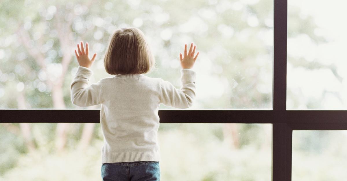 Child looking out the window.