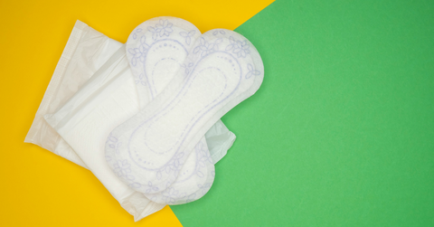 Four pair of pantyliners lay in a pile, unused
