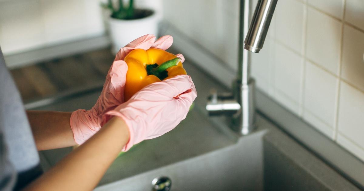 Washing peppers.