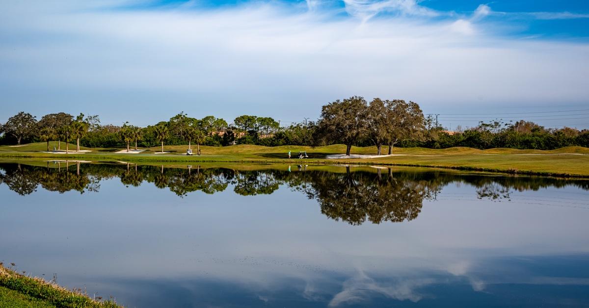 Golf course by a man-made pond in Sarasota, Florida. 