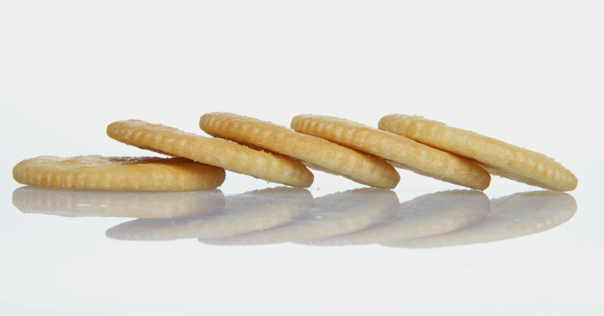 Five Ritz Crackers are stacked together