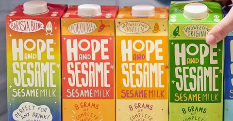 Four of Hope and Sesame's sesame milk cartons in various colors