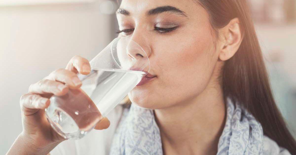 Young woman drinking a glass of water (Representative Cover Image Source: Getty Images | Seb_ra)