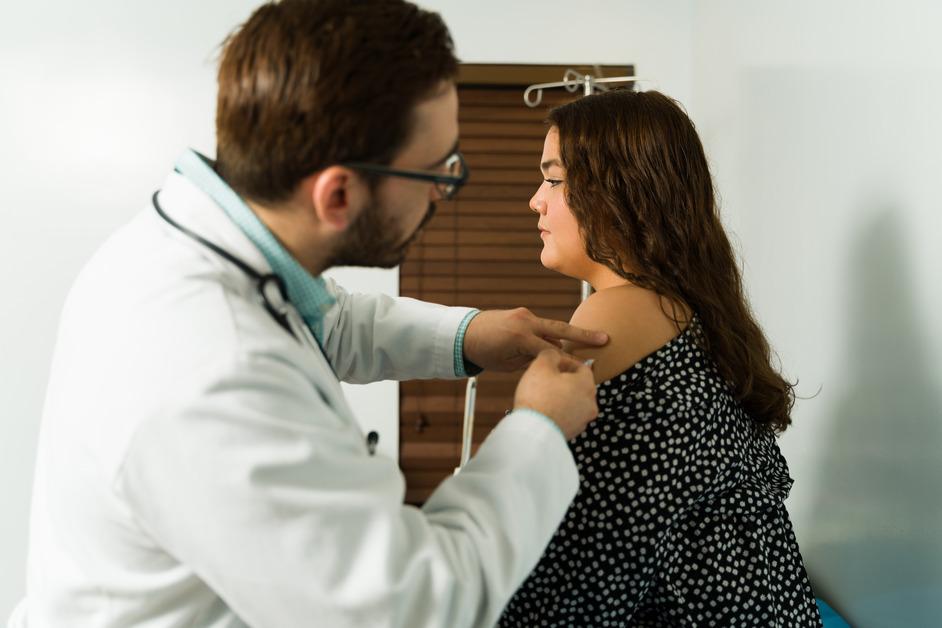 Girl receiving vaccine