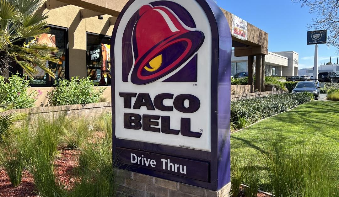 A close-up of a Taco Bell Drive Thru sign 