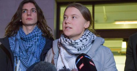 Greta Thunberg address news crews during an interview