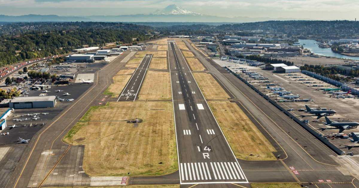 Aerial view of King County International Airport looking south down Runway 14R toward Mount Rainier (Cover Image Source: kingcounty.gov)