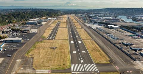 Aerial view of King County International Airport looking south down Runway 14R toward Mount Rainier (Cover Image Source: kingcounty.gov)