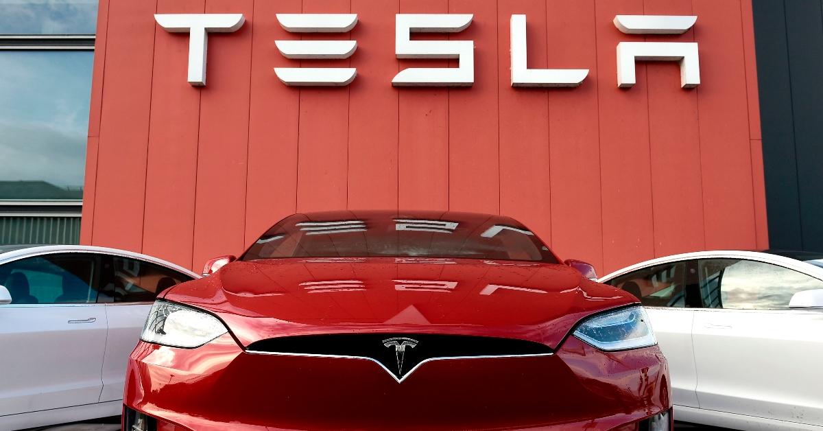 Tesla electric vehicles at a dealership.