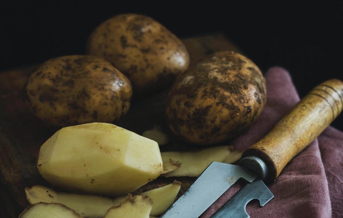 Peeling potatoes