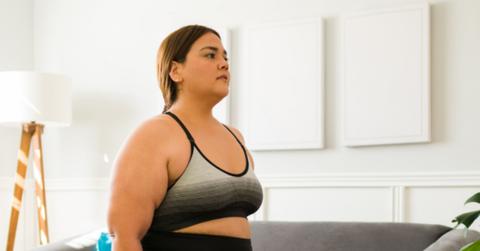 brunette woman in sports bra