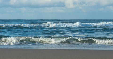 waves breaking on shore