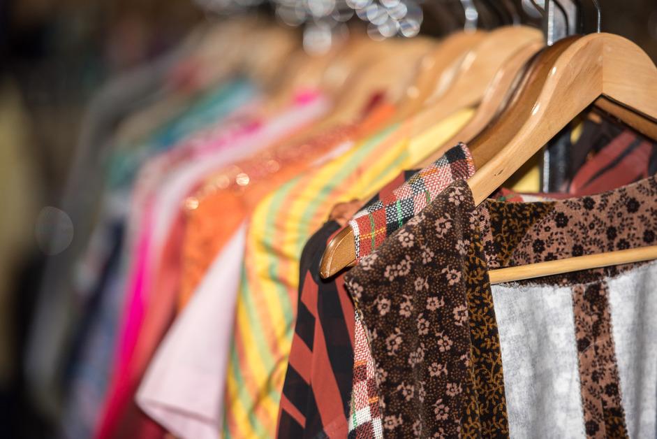 A rack of thrift clothes stock photo.