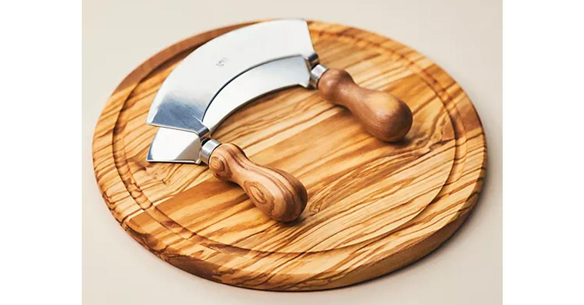 round olive wood cutting board with mezzaluna knife