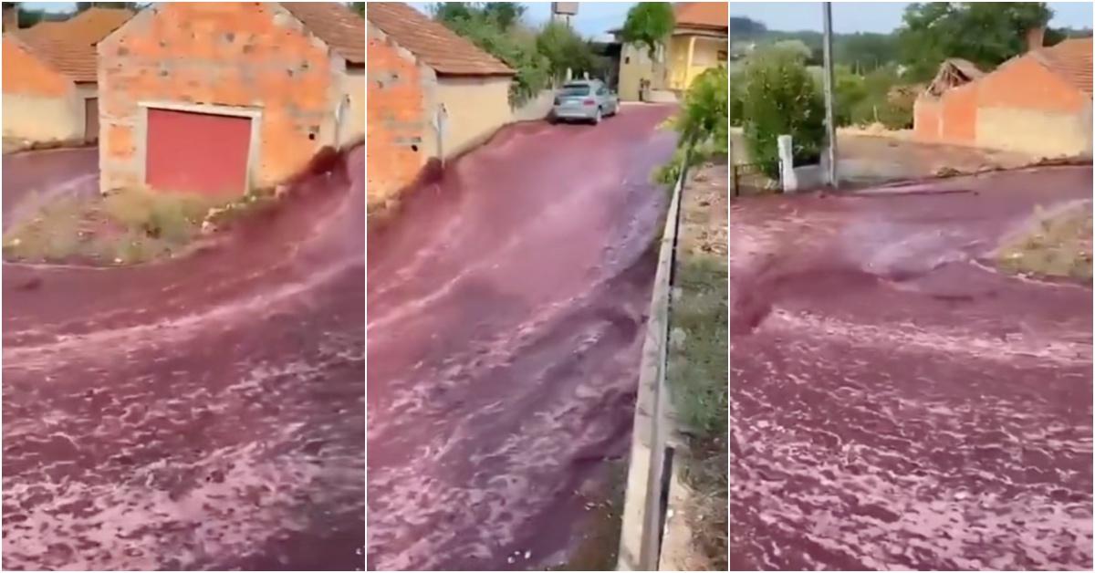 Red wine spills through a town in Portugal