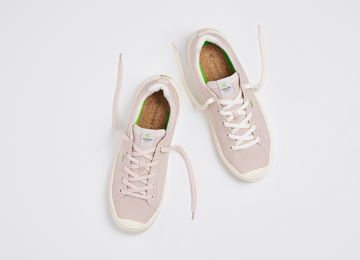 Pink sneakers with white soles from Cariuma. 