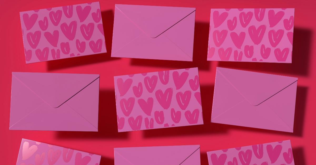 Hot pink background with nine magenta Valentine's Day cards. 