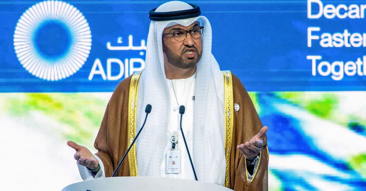 Sultan Ahmed Al Jaber speaks behind podium