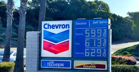Sign at a Chevron gas station listing prices.