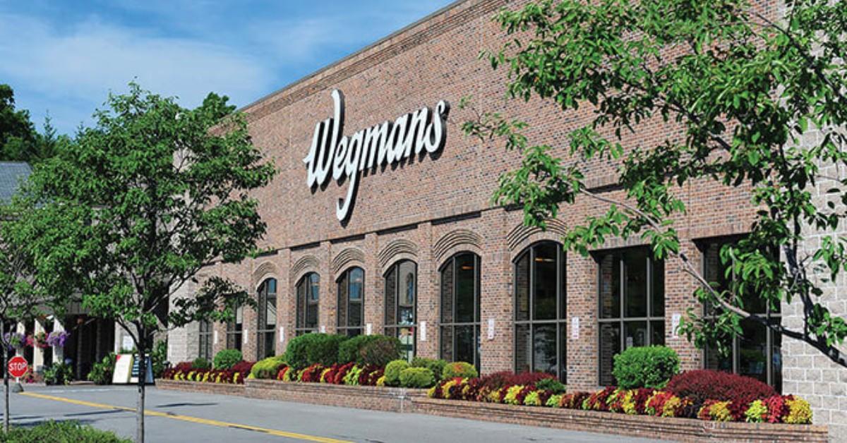 A Wegmans storefront surrounded by trees in Pittsford, New York