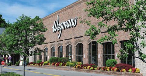 A Wegmans storefront surrounded by trees in Pittsford, New York