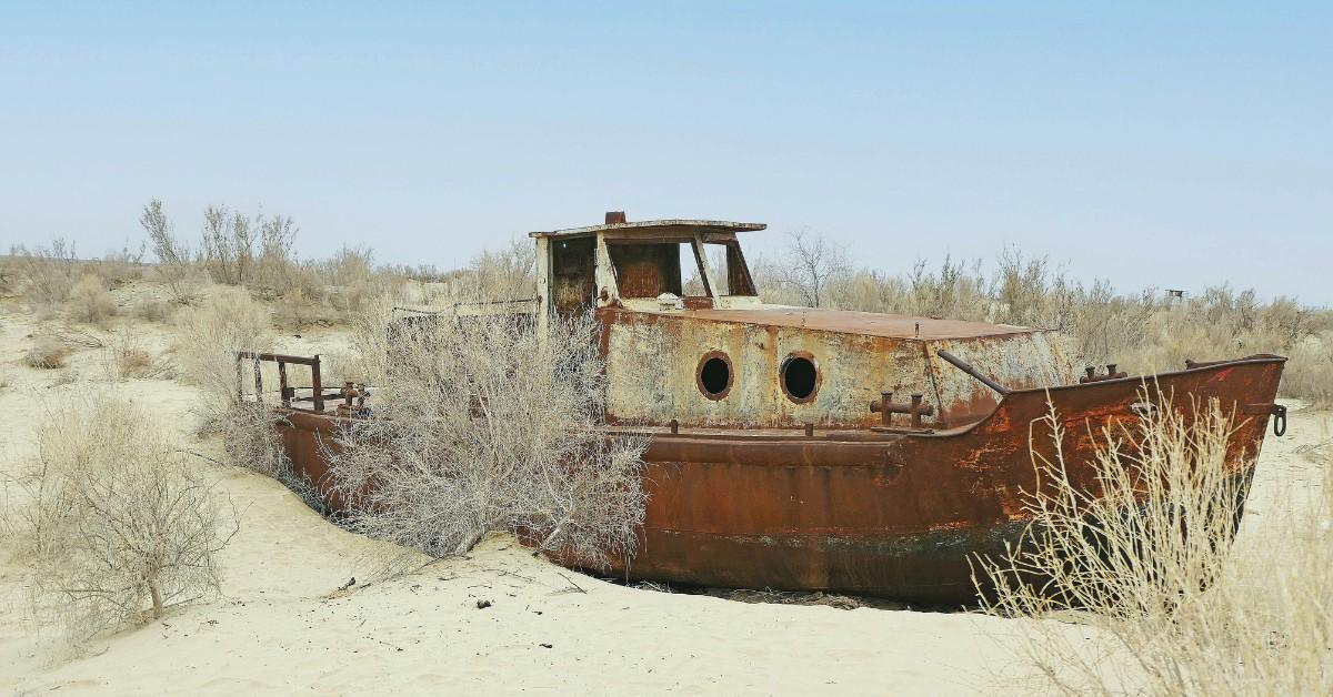An abandoned boat sits where the Aral Sea once was