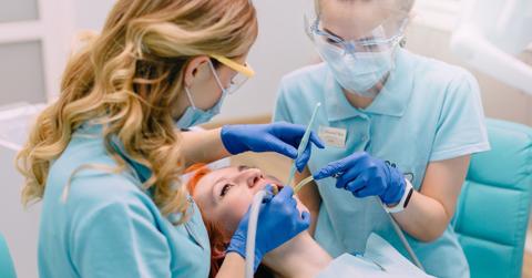 dentists working on a patient