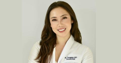 Headshot of triple board-certified dermatologist, internist, and dermatopathologist Dr. Mamina Turegano, MD, FAAD