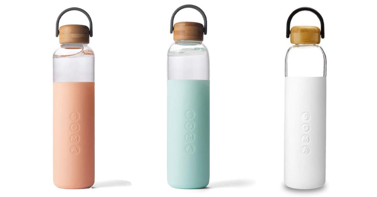 three glass water bottles with silicone sleeves in peach, mint, and white