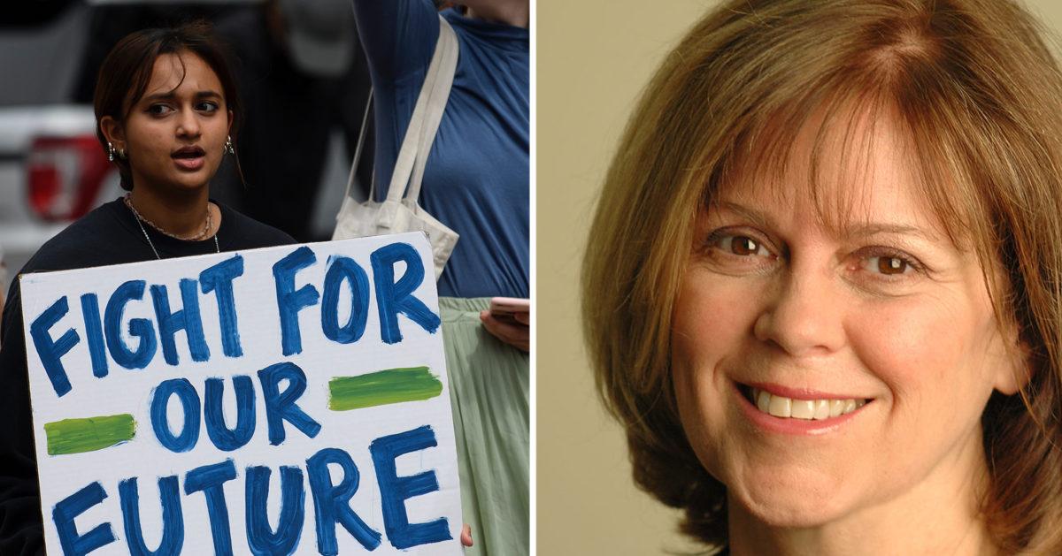 A demonstrator holds a poster that reads “fight for our future” alongside a headshot of Kathleen Rogers