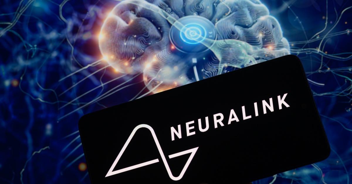 Neuralink logo on a black phone screen with art of a brain in the background.