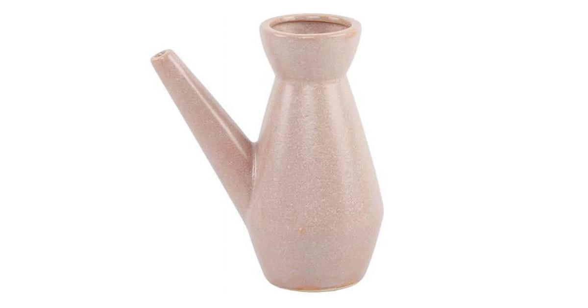 pink geometric ceramic watering can