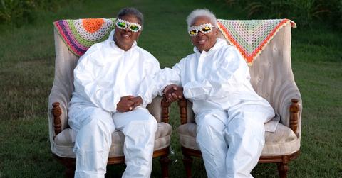 Donna Dear and Paulette Greene wear all-white outfits, sitting in two armchairs at Mt. Pleasant Acres Farms