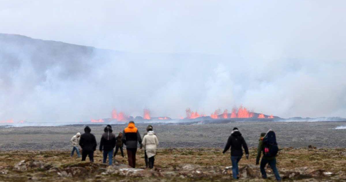 Tourists watching a volcanic eruption. (Representative Image Source: Getty Images | Micah Garen)