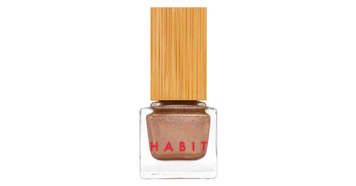 copper colored nail polish in a bottle