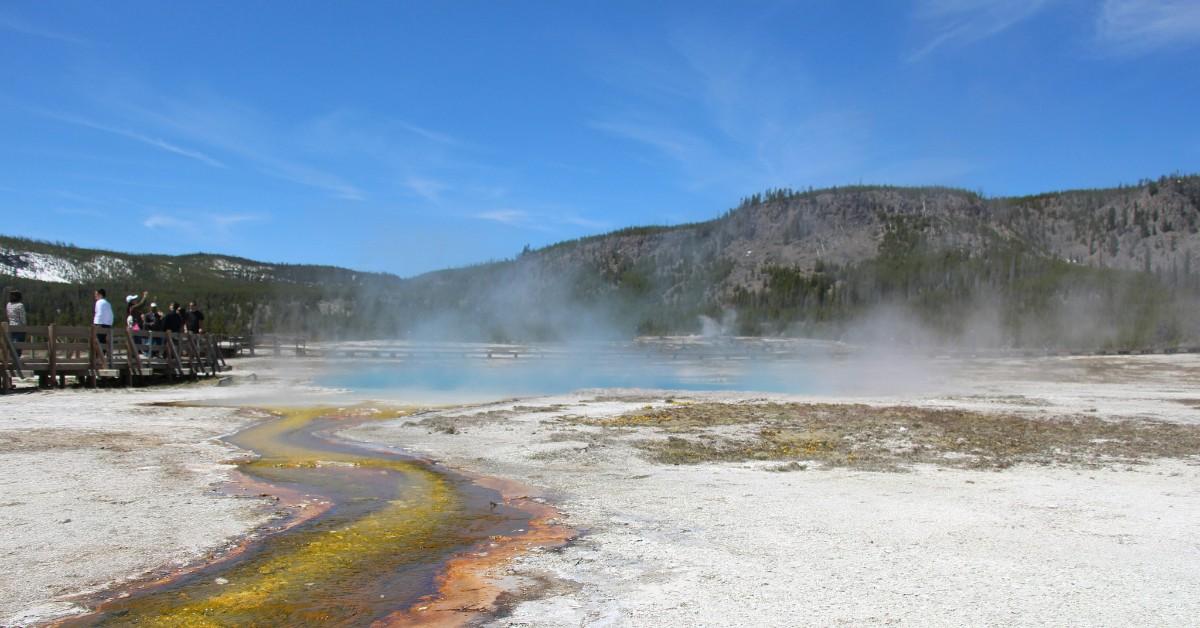 Steam hangs over a geyser in Yellowstone