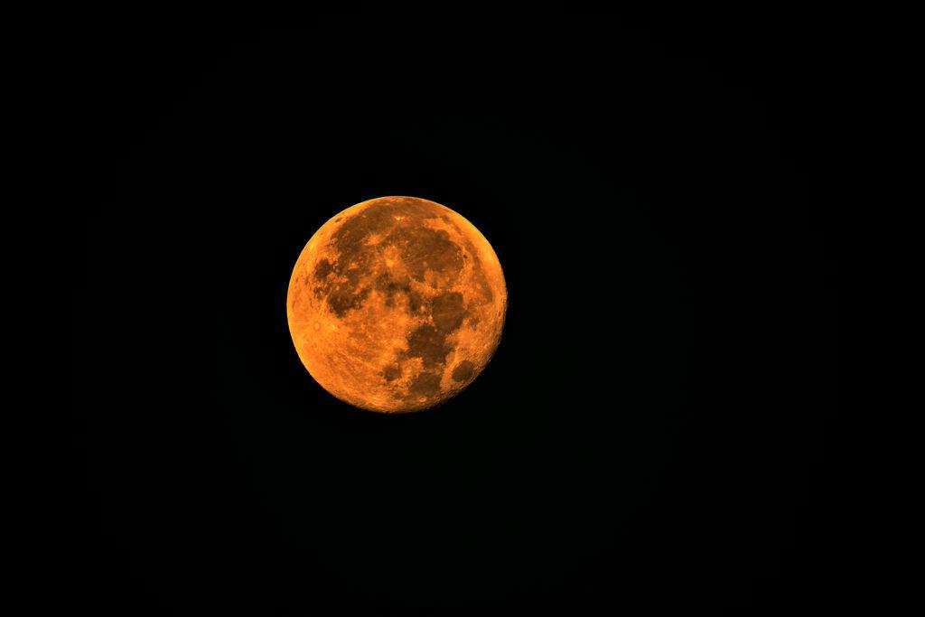 Here's Why Tonight's Moon Appears Orange, Explained