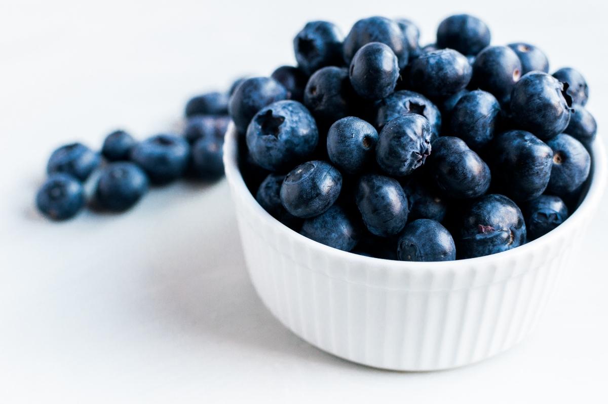 Large blueberries in a white bowl