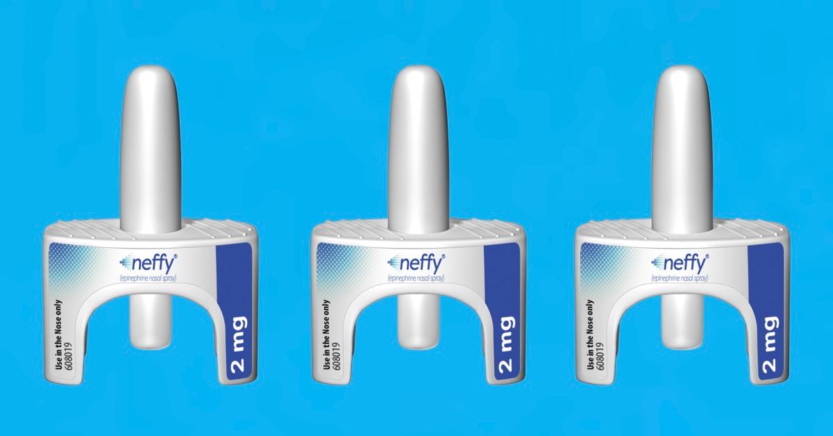 Three Neffy inhalers on blue background