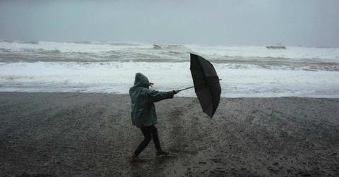 A man struggles with strong gusts of wind during a storm (Representative Cover Image Source: Pexels | Dziana Hasanbekava)