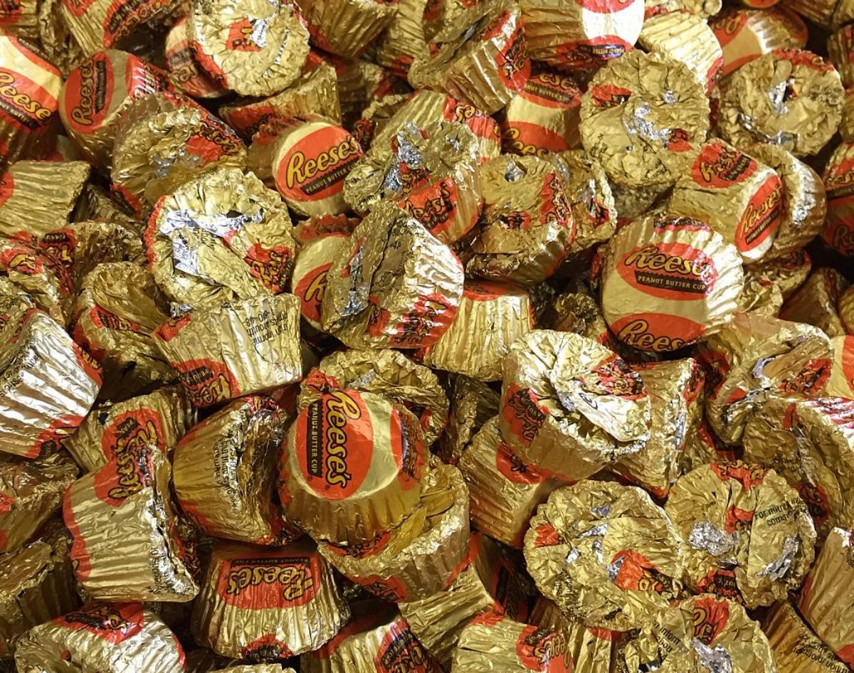 pile of mini Reese's Peanut Butter Cups in wrappers