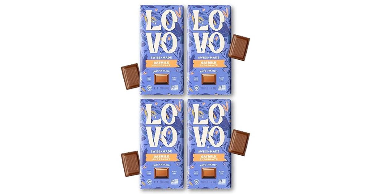 Theo Chocolate Pure Organic Milk Chocolate Bar, four chocolate bars in blue wrappers