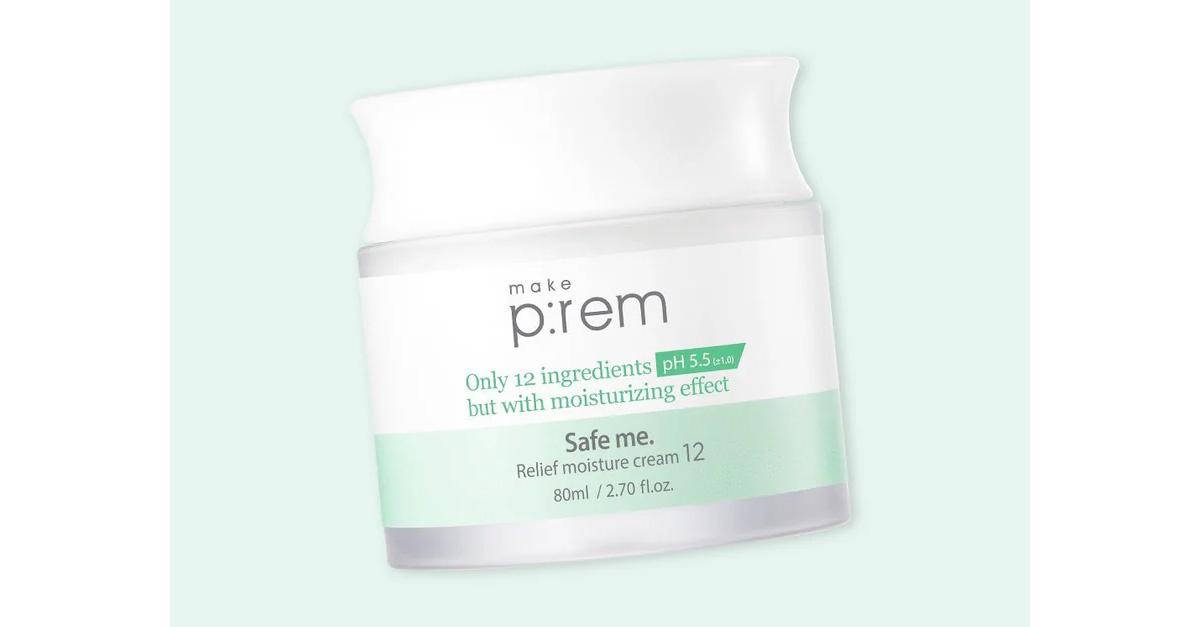 Korean skincare moisturizer in a white and green tub