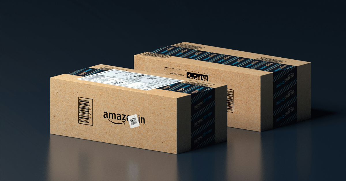 A pair of Amazon package sit on a black surface