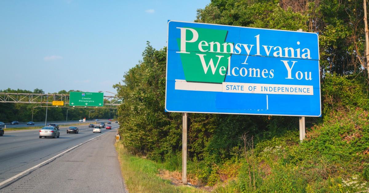 The Pennsylvania Welcomes You sign sits on the side of the road in the state where a grandmother is believed to have fallen down a sinkhole 