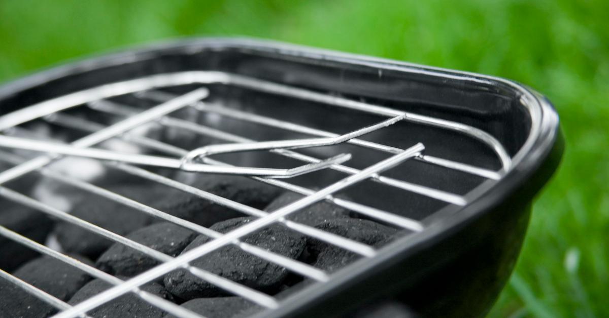 Close-up photograph of a charcoal grill.